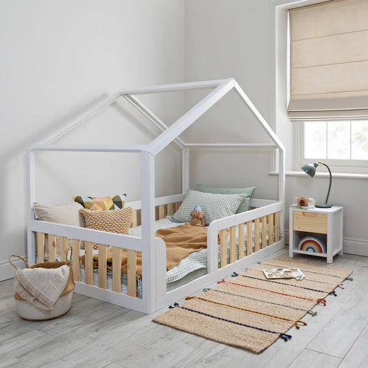 How can I make my toddler's first night in a new bed go smoothly?