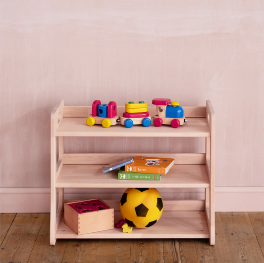 How do I style a house bed in my child's nursery?
