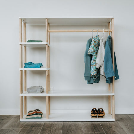Roomix Montessori wardrobe with hanging rod and shelves, made from natural wood promoting tidy kids’ rooms